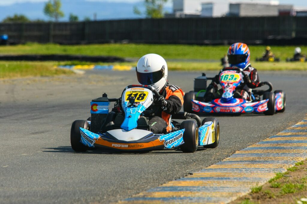 Competitive go-kart racing on a track, offering an exhilarating experience as part of Budapest stag party packages.