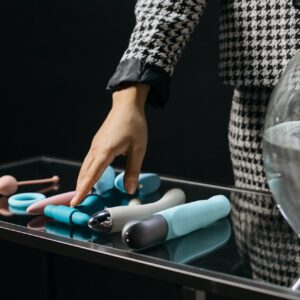 A lady choosing the best vibrator for a vibrator show in Budapest stag party.