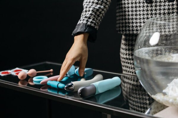 A lady choosing the best vibrator for a vibrator show in Budapest stag party.