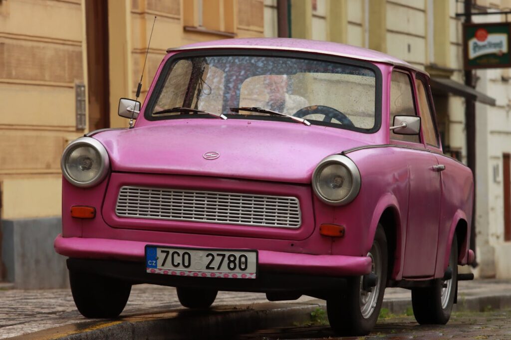 Retro pink Trabant car, perfect for an authentic Budapest stag party experience with unique activities