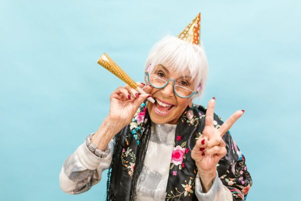 Older lady in party costume represents granny stripper budapest stag,