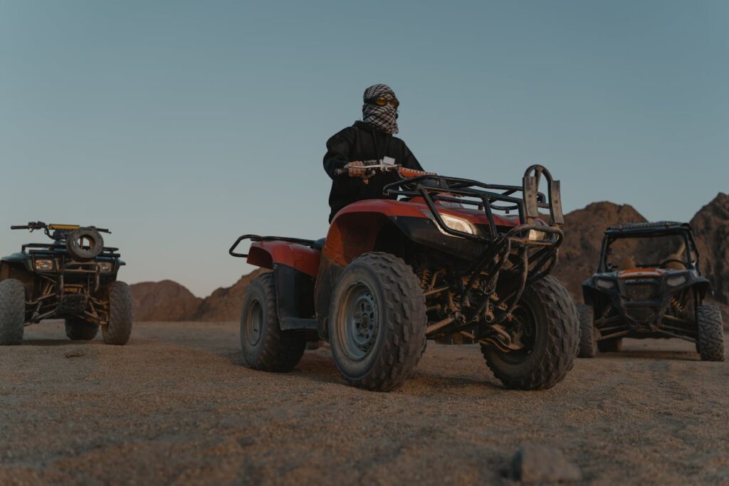 An adventurous quad biking activity set in rugged terrain, perfect for a thrilling stag do party experience in Budapest.